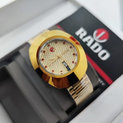 Rado DiaStar gold dial adorned with red hour