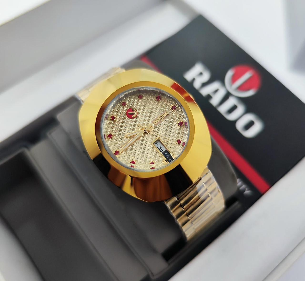 Rado DiaStar gold dial adorned with red hour