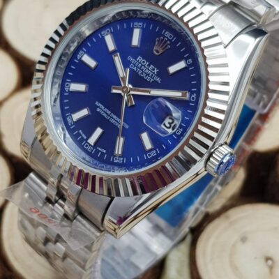 Rolex Datejust blue dial with a fluted bezel and silver-tone