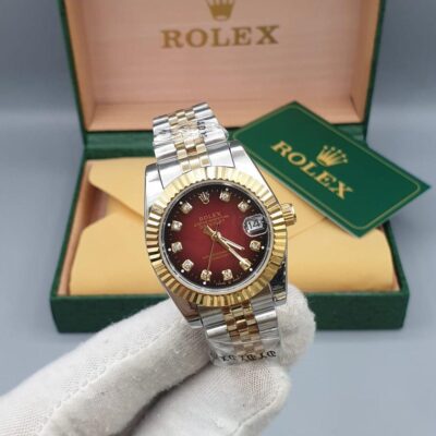 Rolex Datejust yellow gold design with a red dial and diamond hour marker