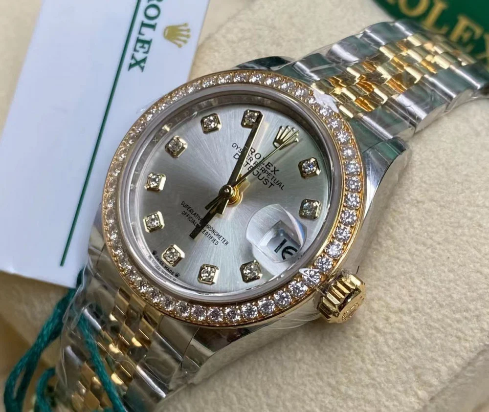 Rolex Datejust women's watch, featuring a grey dial, diamond markers, and a jubilee bracelet.